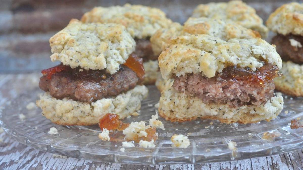 Spice up your brunch game with these black pepper biscuits with sausage and jalapeño jam.