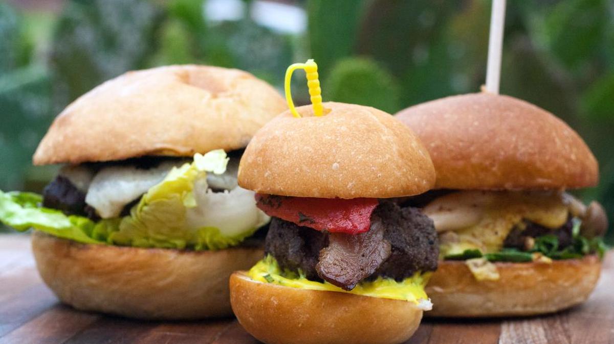 From left: a buffalo and shiitake mushroom burger from chef Tim Byres; a mushroom duxelles and beef slider from chef Scott Romano and a maitake mushroom-beef blend burger from chef Taylor Kearney.