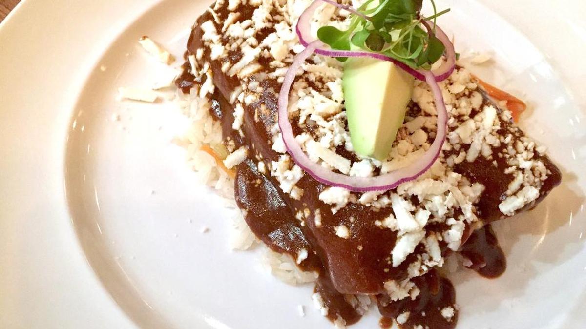 Mole enchiladas from chef Olga Sosa’s Veracruz family recipe at Mesa in Grapevine.