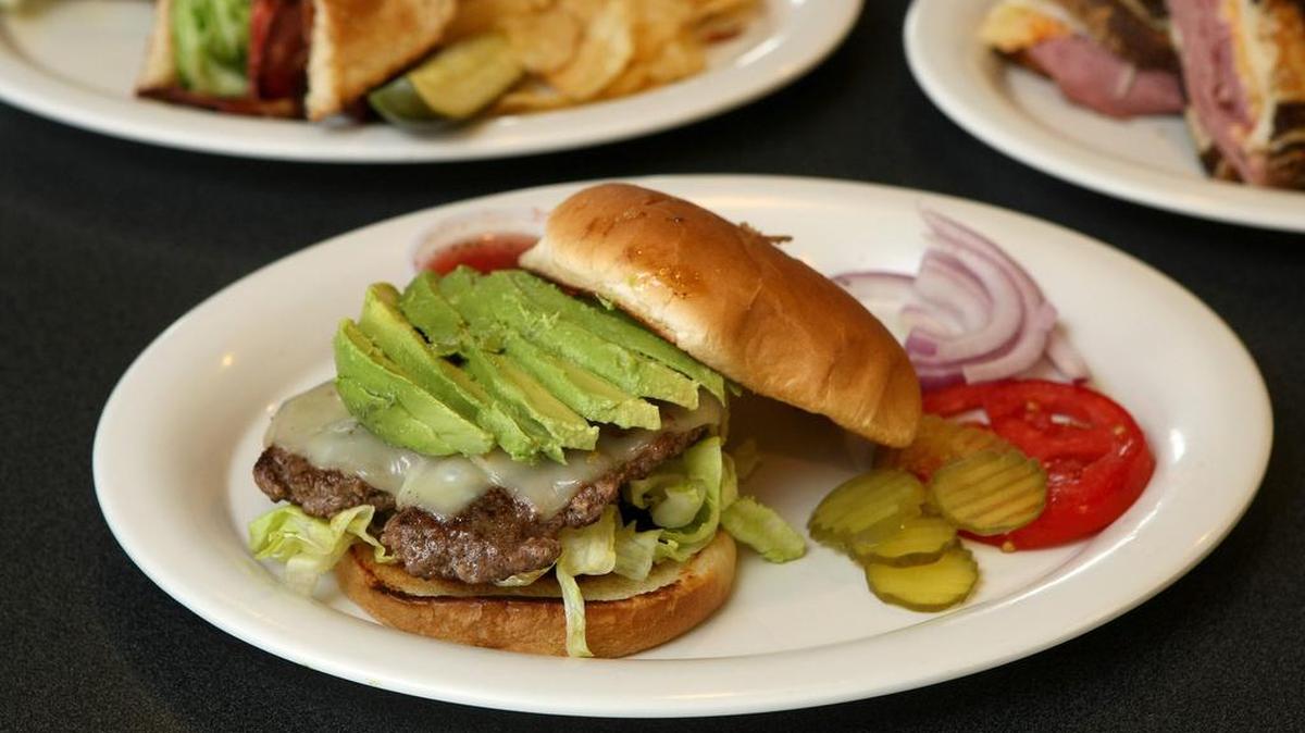 A Beacon Cafe burger with avocado