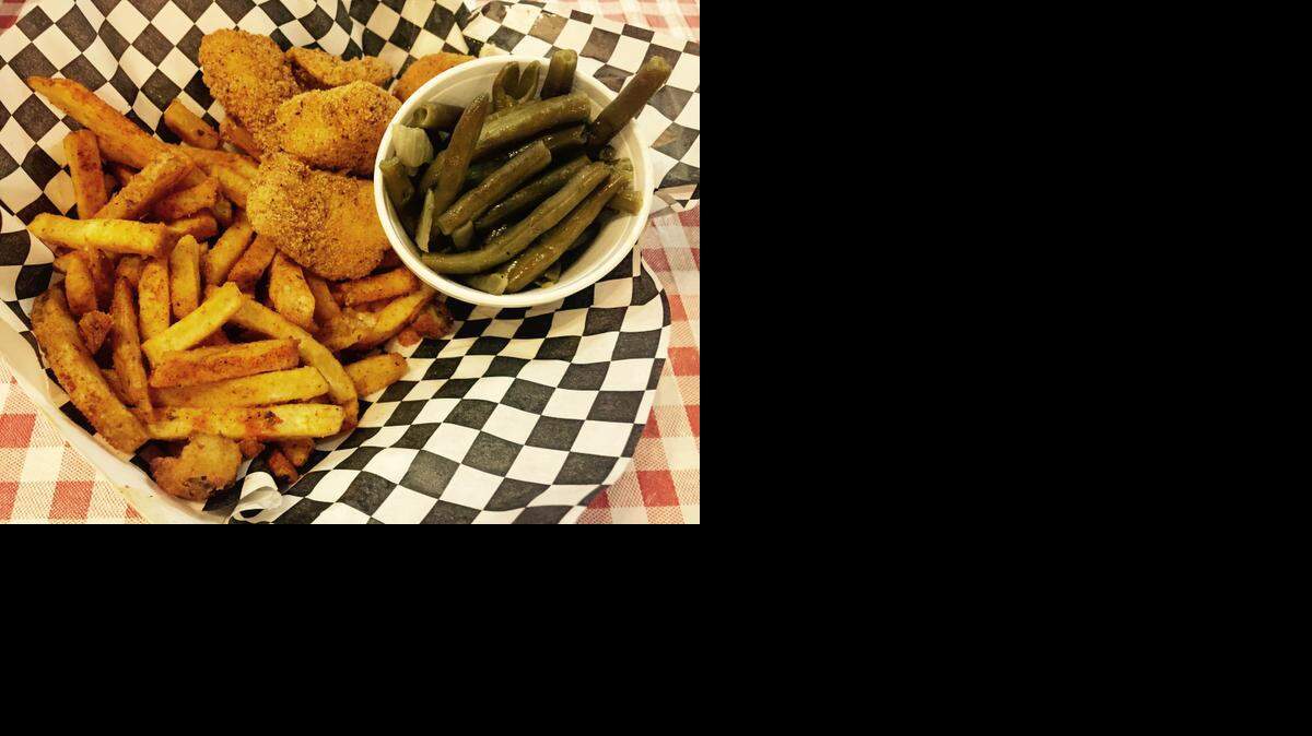 
Eddie Deen’s Crossroads BBQ also serves catfish in a light cornmeal batter with seasoned fries.
