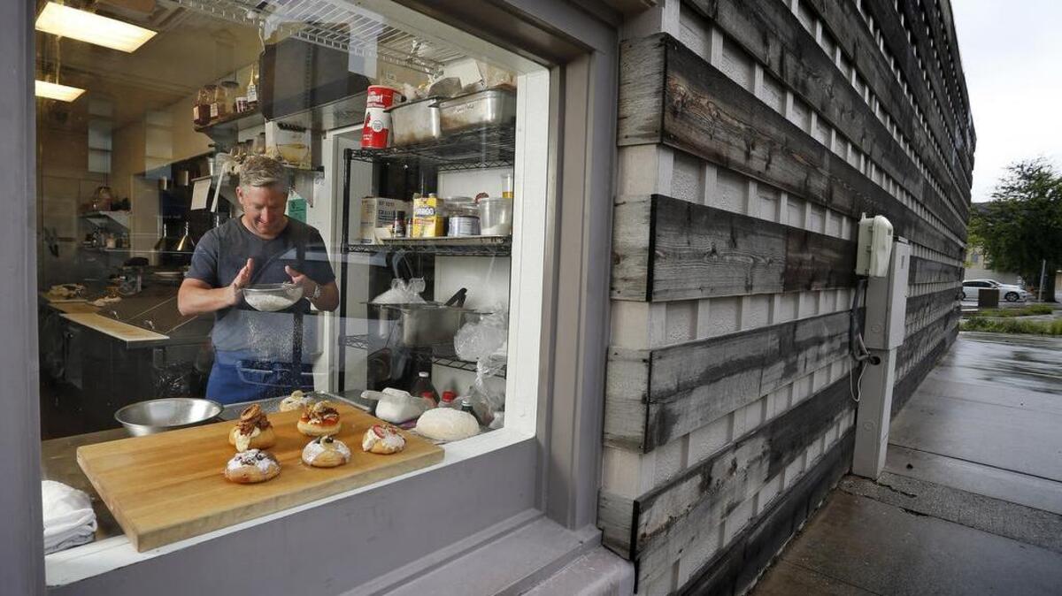 Chef Tim Love is making and selling gourmet donuts from "Back Dough", which is the back door of his Queenie's Steakhouse just off of the town square in Denton.