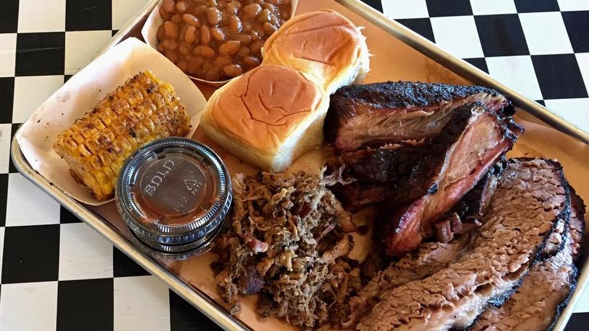 Brisket, pulled pork and pork ribs with smoked corn at 407BBQ in Corral City.