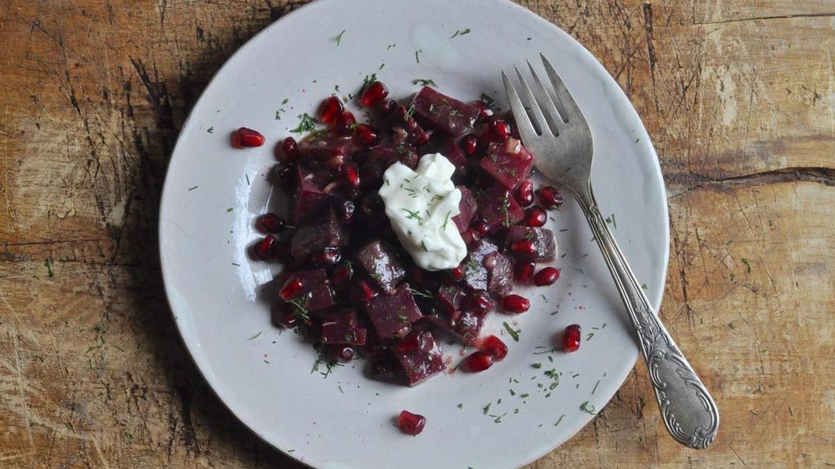 A riff on the Ukranian soup, borscht, this beet salad has extra crunch and texture with pomegranate seeds.