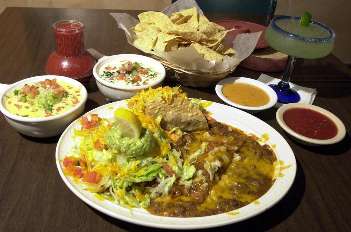 90 years of history at The Original Mexican Eats Cafe: a “Roosevelt Special” with chalupa, enchilada, taco and dips.
