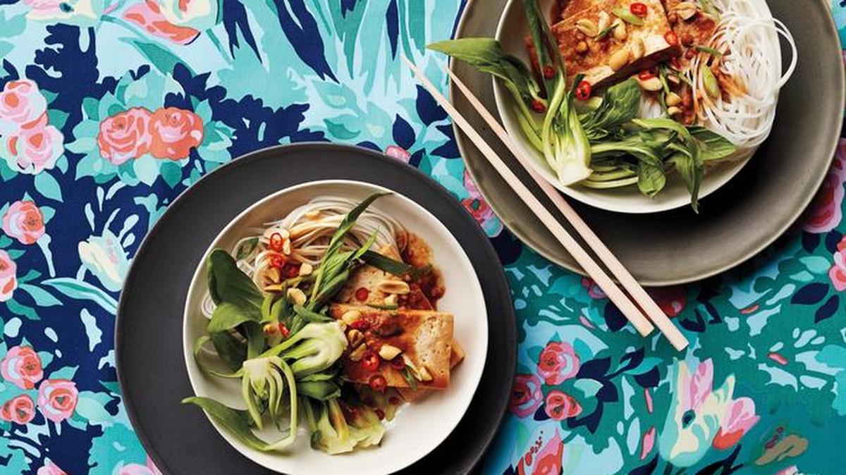 Make it meatless: Tofu, bok choy and noodles are topped with an easy peanut sauce and sliced chiles.