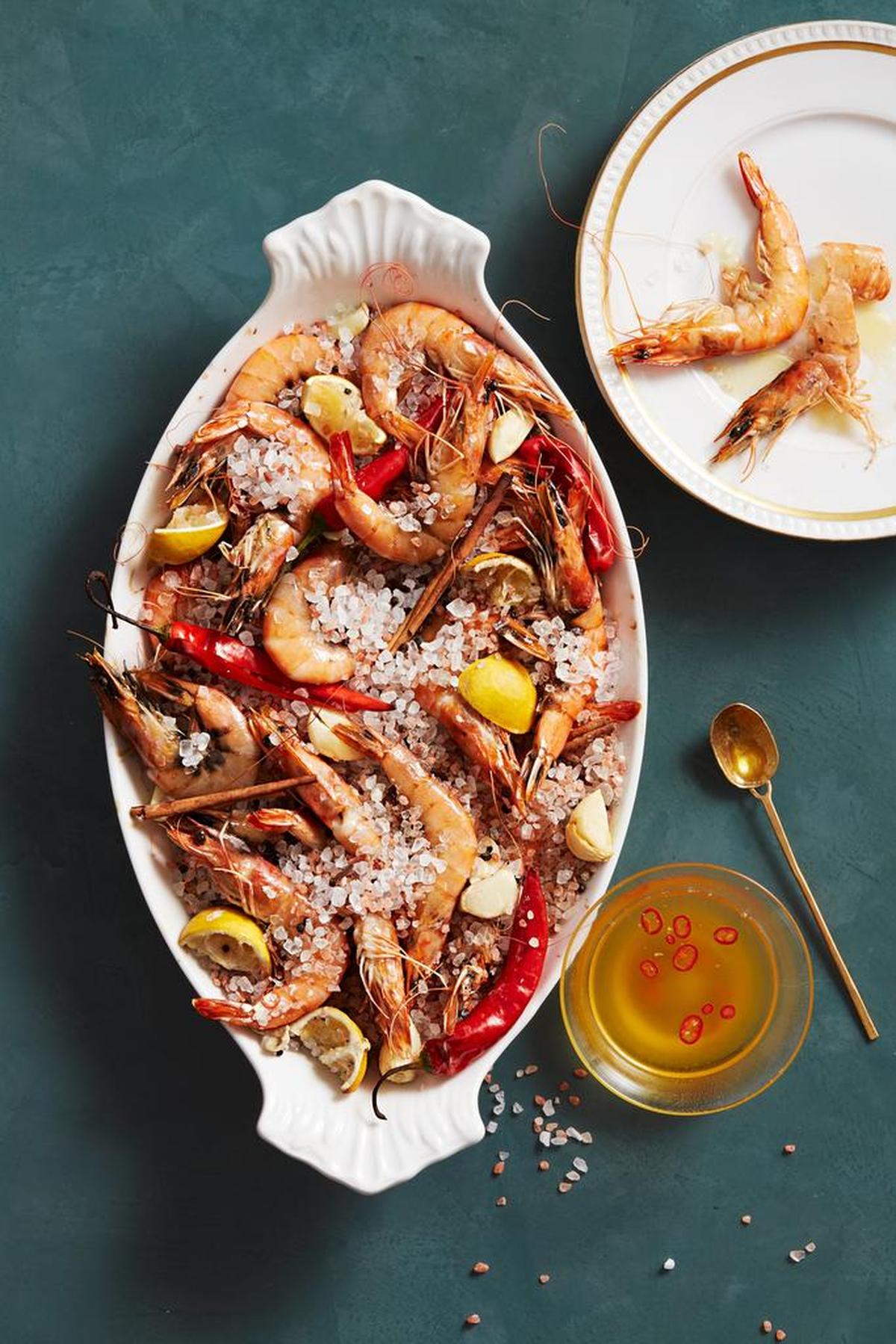 When serving prawns, set out a few empty bowls for the shells, and give guests finger bowls of lemon water.