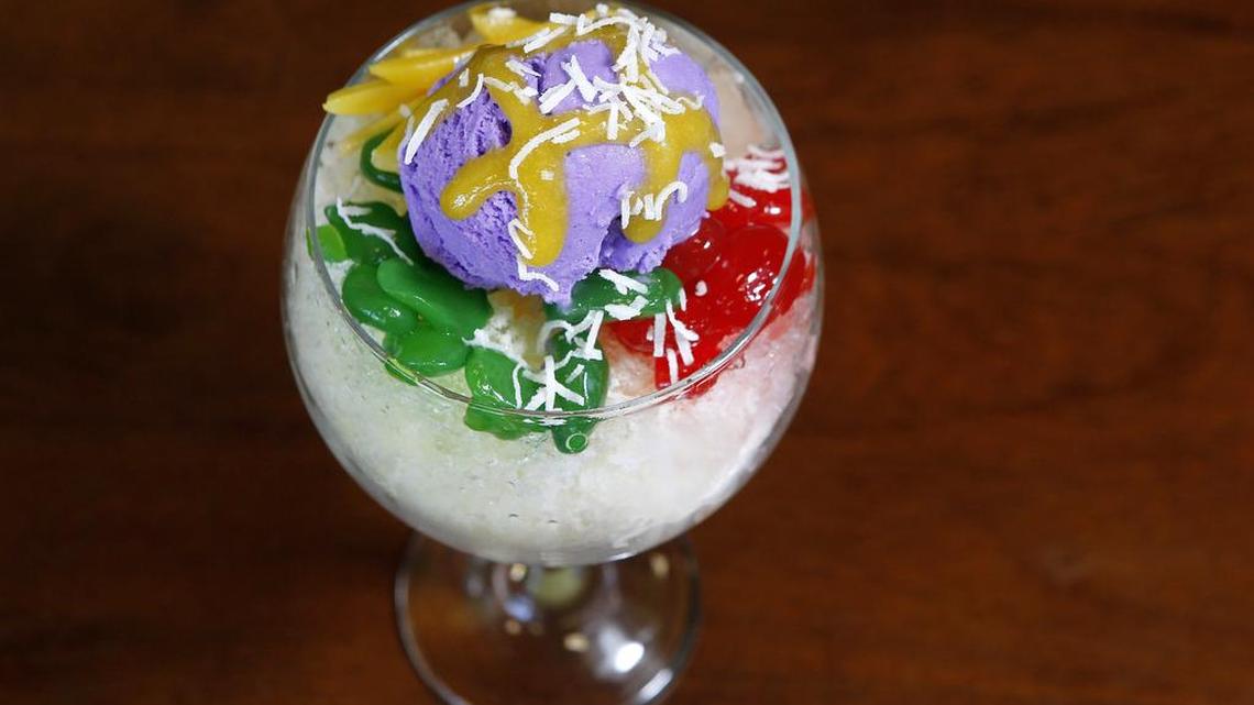 Halo-halo — shaved ice topped with a scoop of lavender-colored ube ice cream, jack fruit and tapioca pearls, all over evaporated coconut milk — at DelCiano Pinoy Cuisine in Arlington