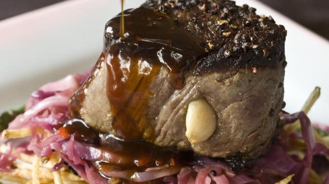 The roast garlic-stuffed tenderloin at Lonesome Dove.