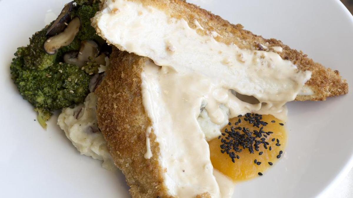 Kona Grill’s signature macadamia chicken will be served in salad form at a West 7th event Sunday.