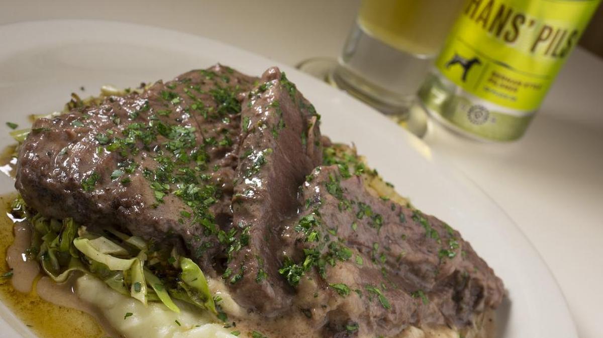
Sauerbraten, potatoes and sautéed cabbage at Swiss Pastry Shop.
