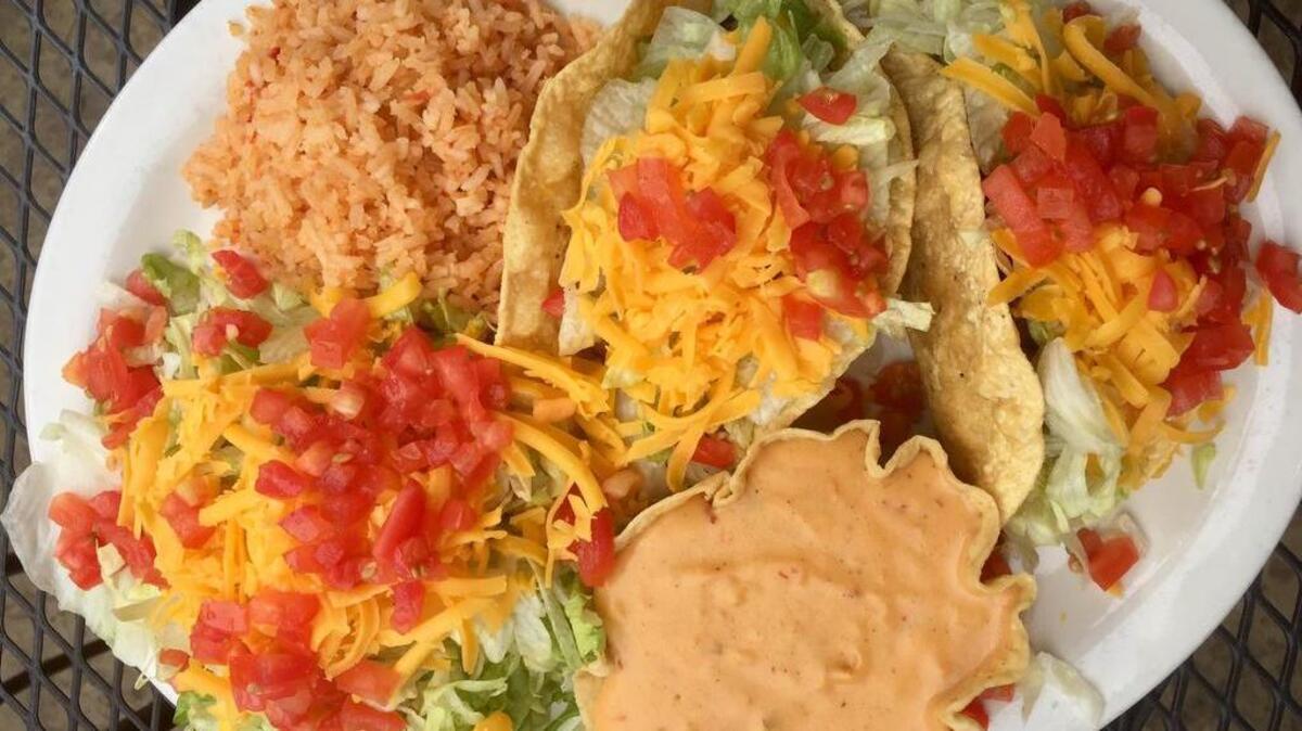 This was The Original’s No. 1 combination in 1932: 2 crispy tacos, queso, rice and salad.