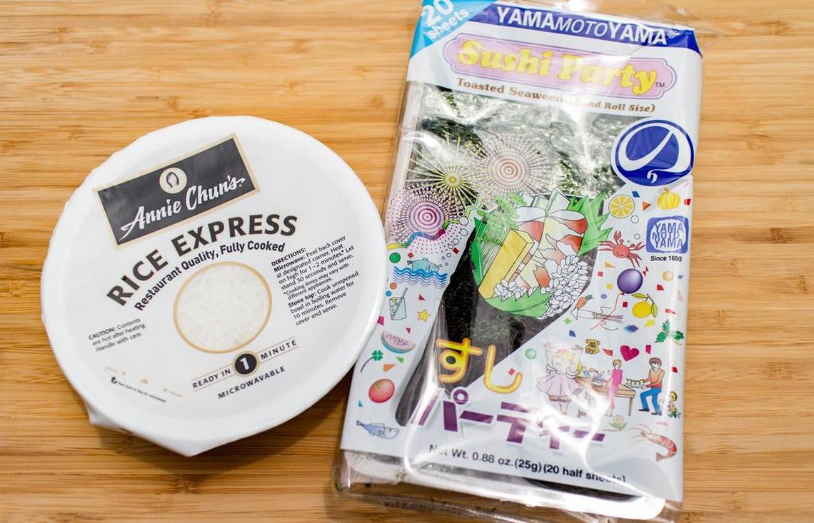 Precooked sushi grade rice and nori for wrapping the musubi were both available at my local Walmart.