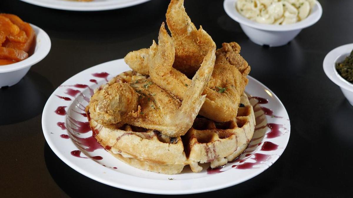 The Three Wings and Blueberry Waffle at Taste N See Chicken & Waffles in Fort Worth