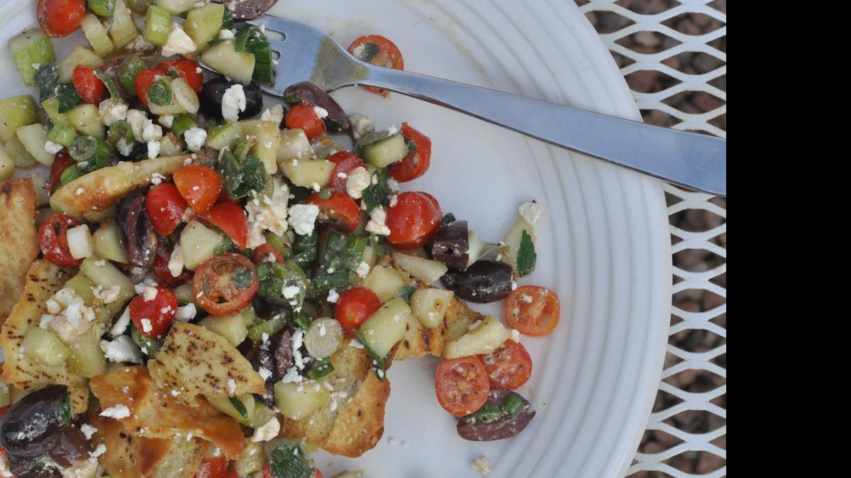 
I love to make Chopped Greek toasted pita bread salad with oregano and mint from my own garden.
