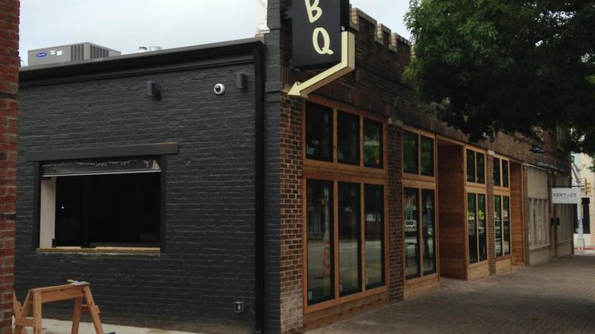 Signage at Heim Barbecue’s brick and mortar location