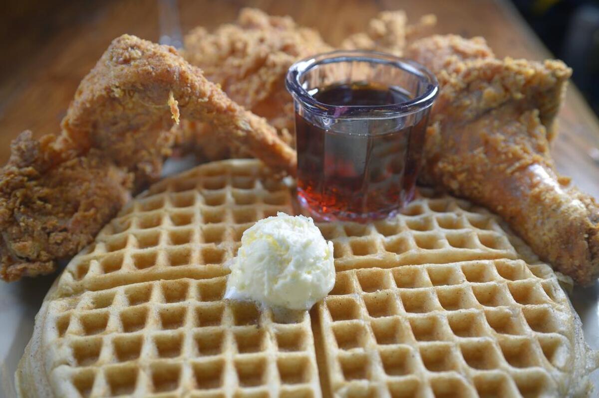 Restaurant News for the August issue of Indulge magazine. Chicken and waffles dish with mimosa at the Lo-Lo's Chicken & Waffles in Southlake.
