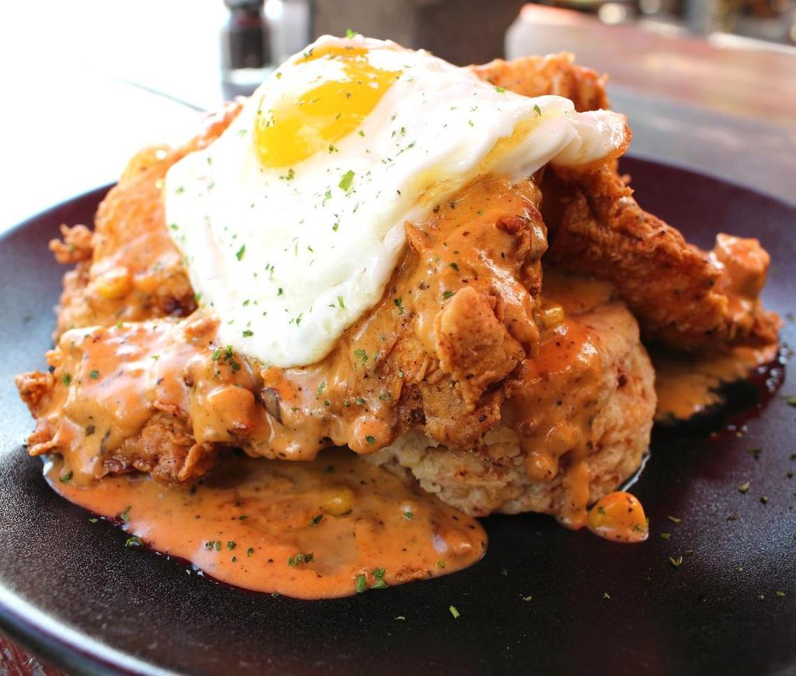 A fried chicken biscuit with egg at Mash’d.