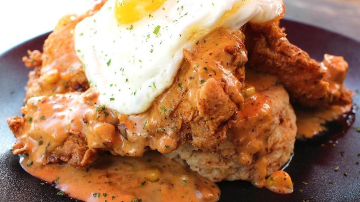 A fried chicken biscuit with egg at Mash’d.