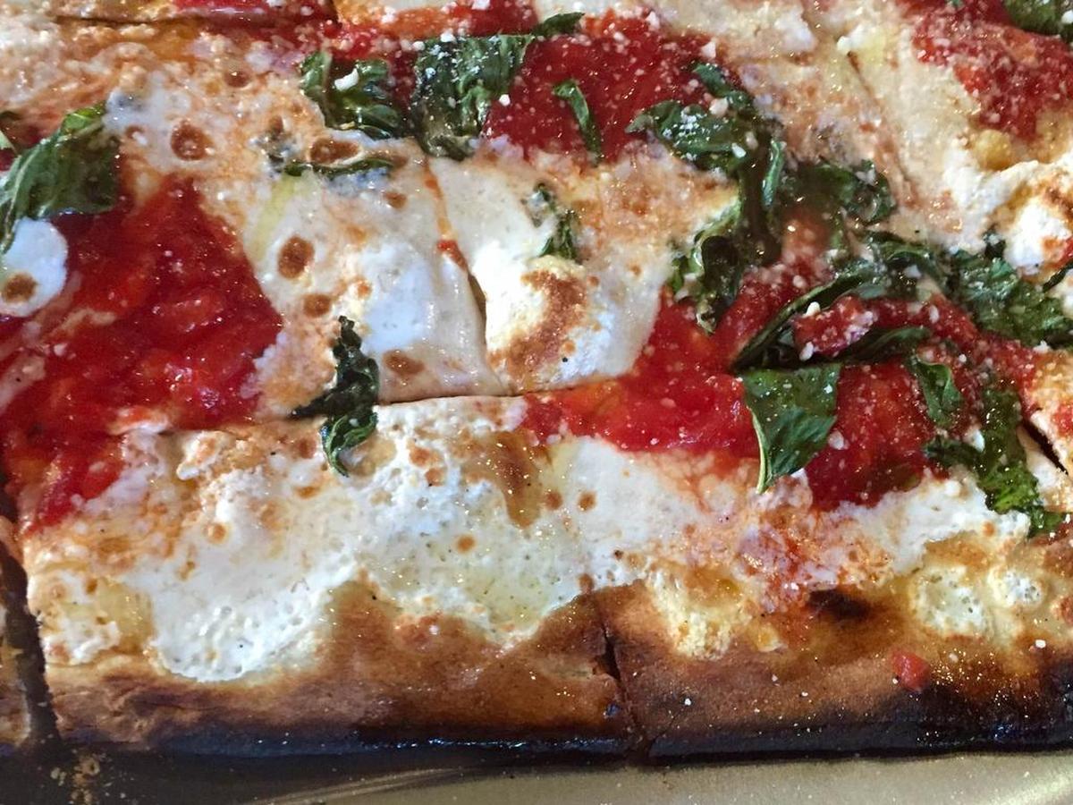 Extra-thin pizza Margherita at Olivella’s.