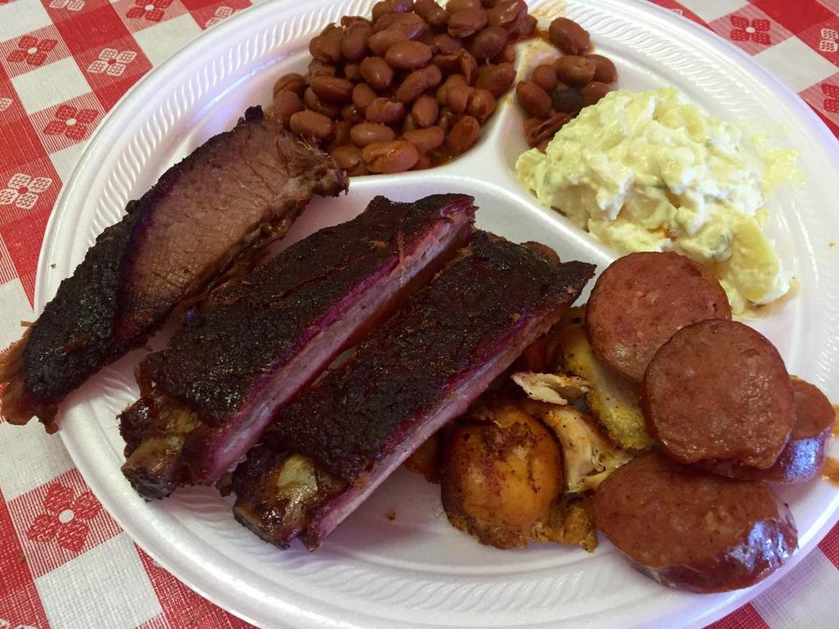 One price buys unlimited brisket, ribs, chicken, pulled pork and Rudolph’s sausage at North Main BBQ.