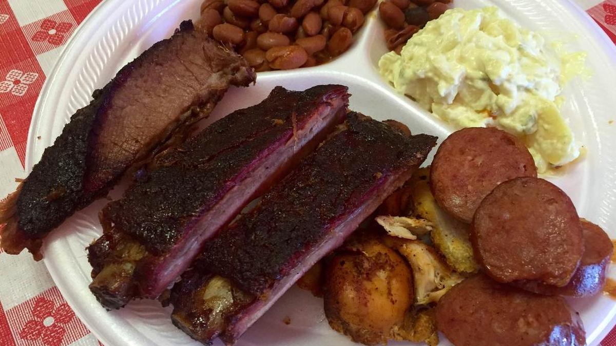 One price buys unlimited brisket, ribs, chicken, pulled pork and Rudolph’s sausage at North Main BBQ.