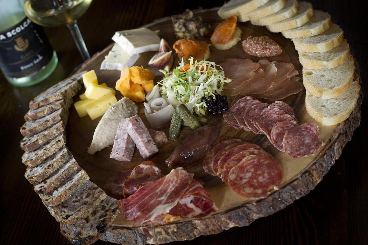 Charcuterie plate with rabbit rillette, country duck paté, coppa, finocchiona, house salami, Lonza and Nduja at Great Scott in Grapevine.