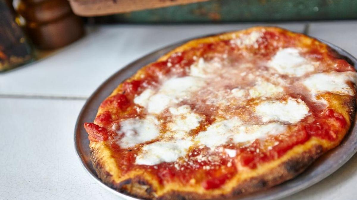 
The new “Big Formaggi” pizza at Olivella’s.
