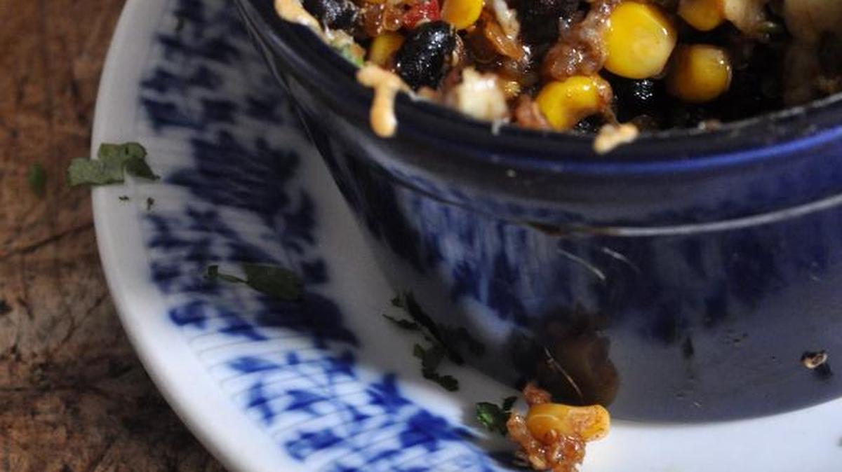 Black bean and quinoa mini casseroles are easy enough for everyday and cute enough to serve for a casual dinner.