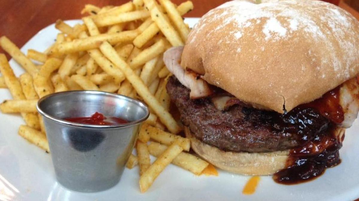 The Jeff Banister burger with “510” fries at FnG Eats in Keller