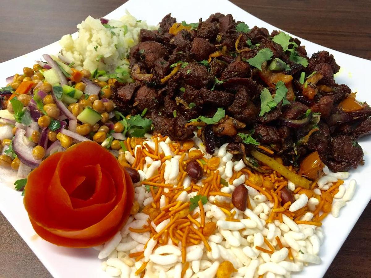 Lamb sukuti with sides at Namaste.