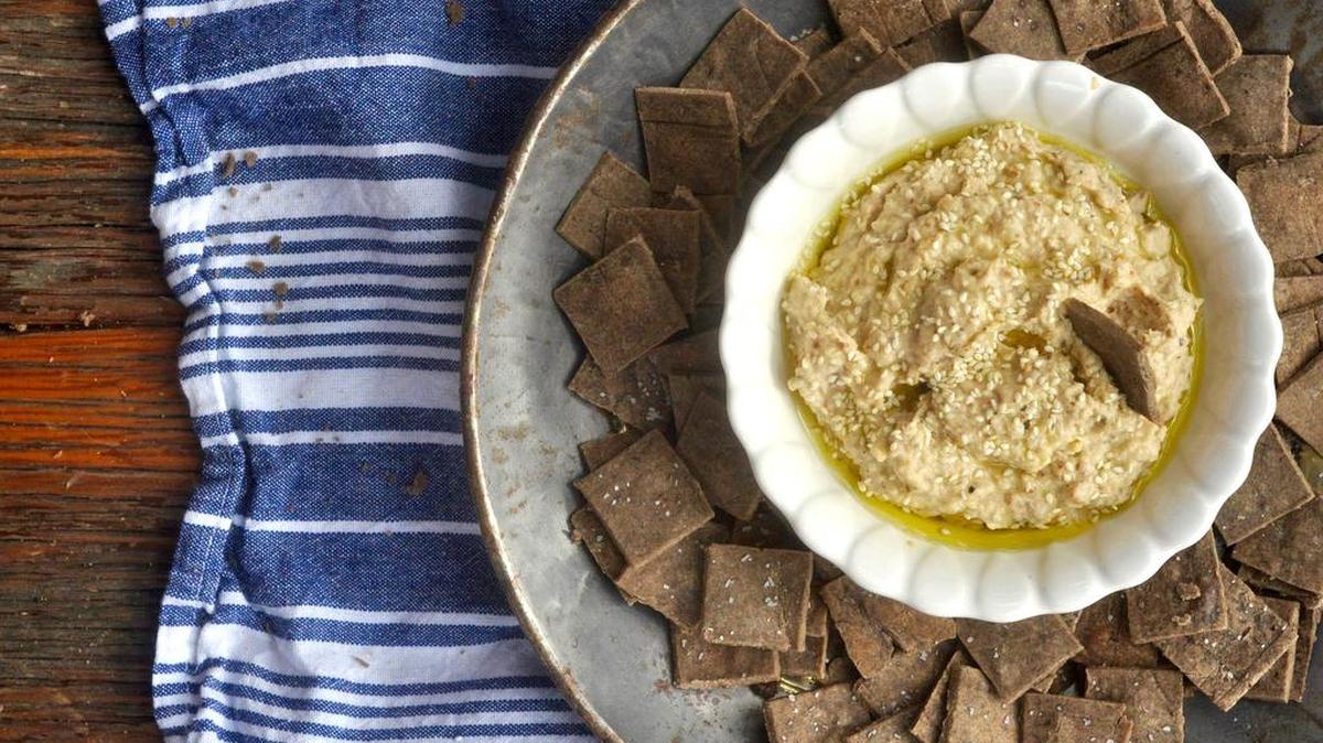Serve a dish of this light cauliflower hummus with gluten-free buckwheat crackers to make it even better.