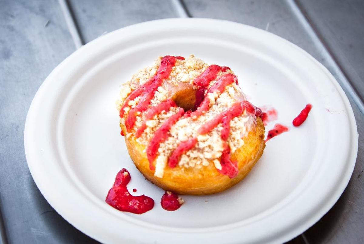 Dough Boy Donut’s strawberry cheesecake donut at Fort Worth Food + Wine Festival’s “Family Sunday Funday —Picnic at Panther Island”.