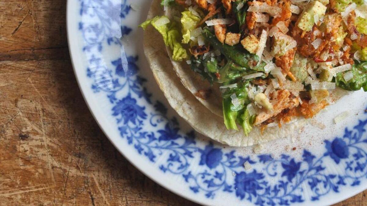 
Chipotle chicken Caesar tostadas marry spicy chicken with your favorite salad. Plus avocado. 
