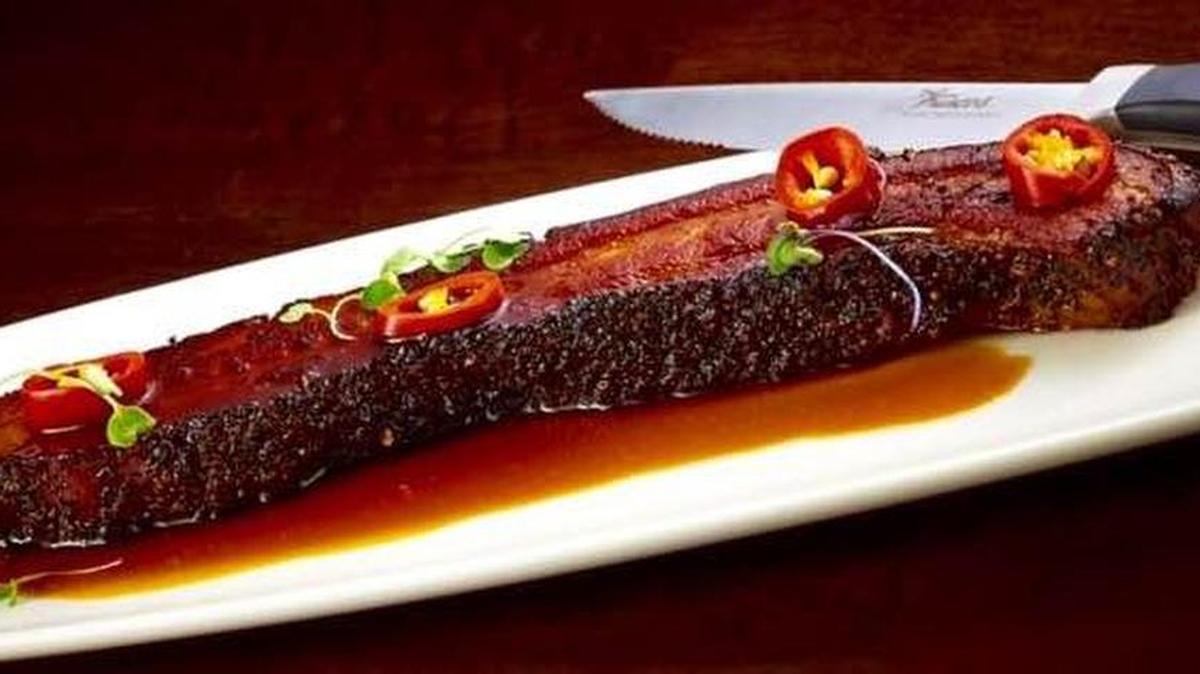 Del Frisco’s Double Eagle bacon au poivre appetizer.
