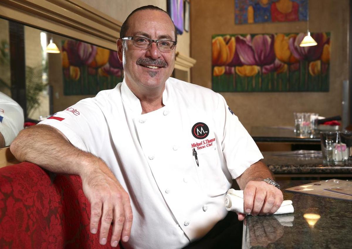 Chef Michael Thompson poses for a portrait in his restaurant Michaels Cuisine Restaurant and Bar .