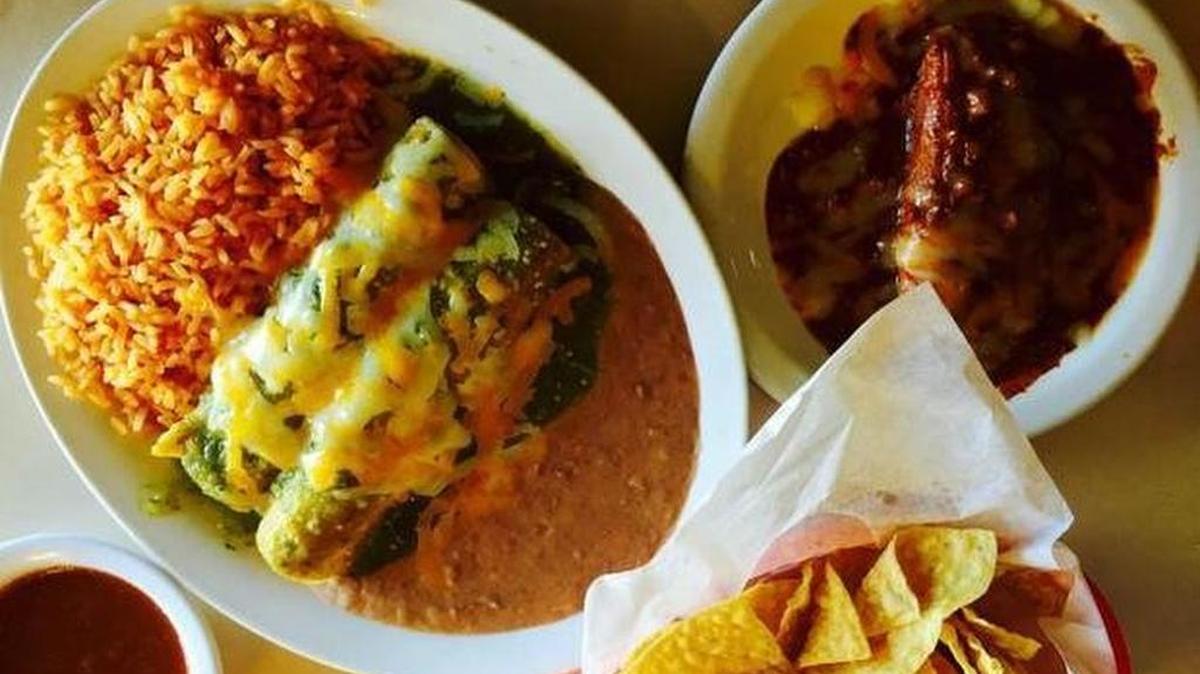 Green chicken enchiladas and a tamal at Cardona Foods.