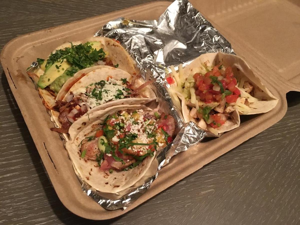Al pastor a la Tuma, ahi tuna and pork carnitas tacos from Urban Taco in Dallas