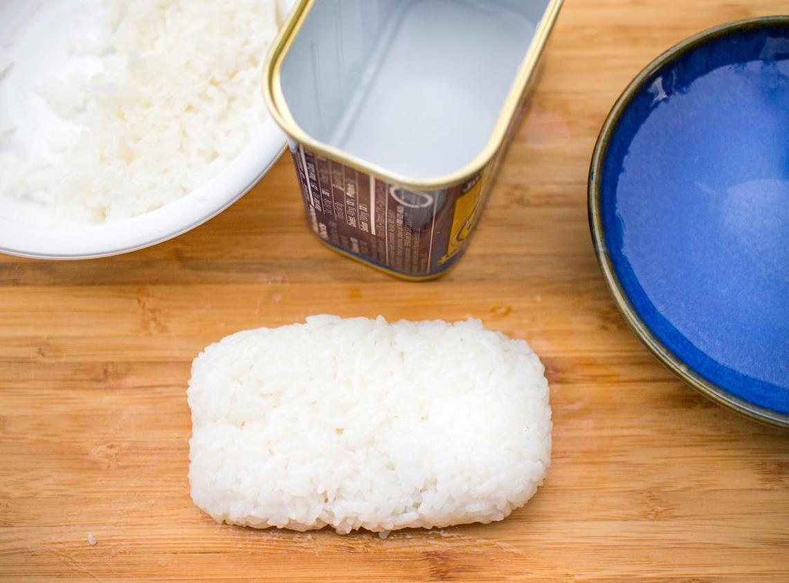 Rice block molded to the shape of the bottom of the Spam can.