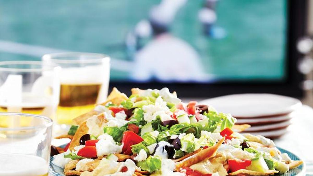 Mediterranean Nachos from The Hungry Fan's Game Day Cookbook by Daina Falk.