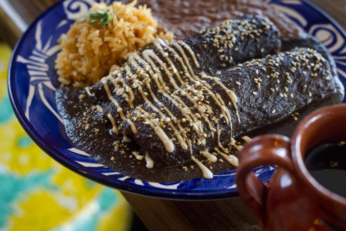 Enmoladas (enchiladas in mole sauce) Mexican cafe de olla (coffee) at Casa Jacaranda.