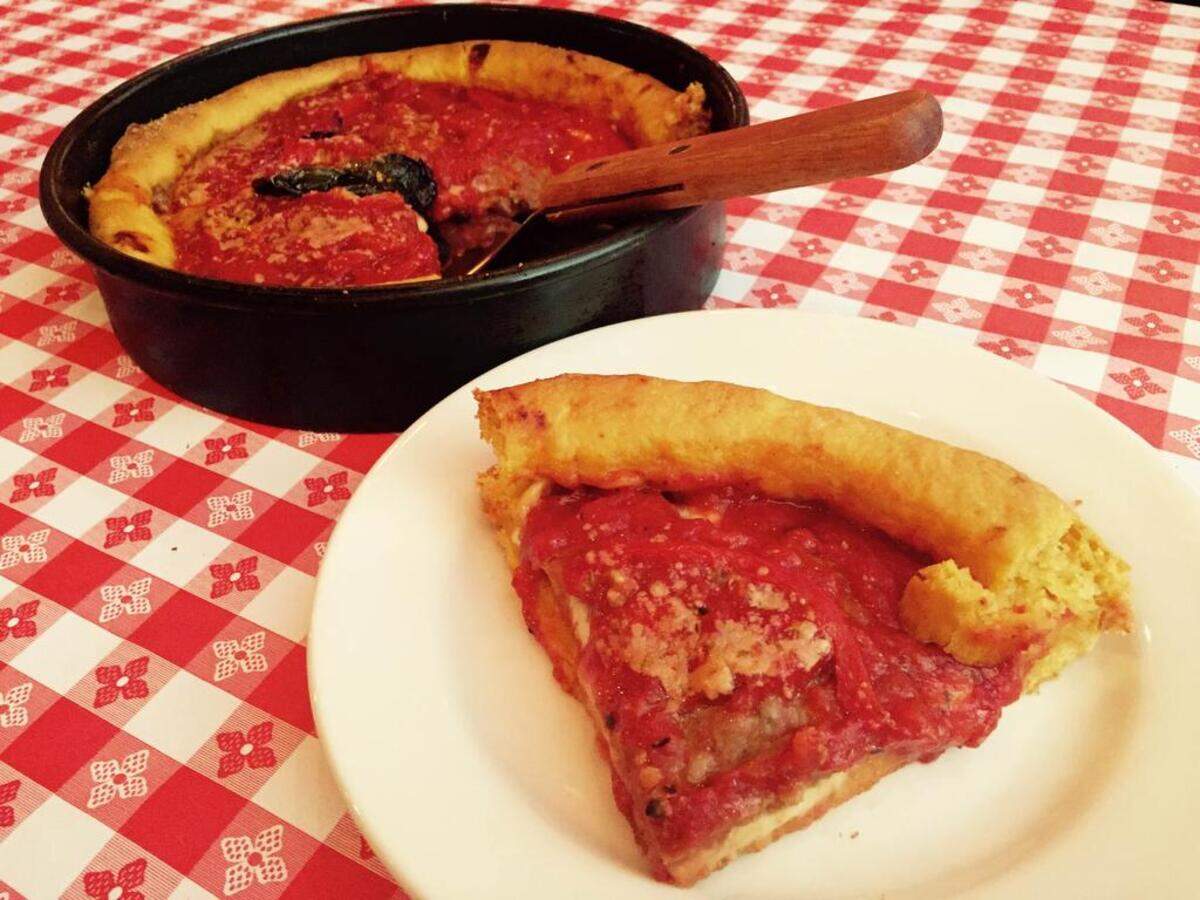 The Gino’s East “Chicago Fire” pizza has spicy sausage, red peppers and Gino’s dense, pie-like crust.