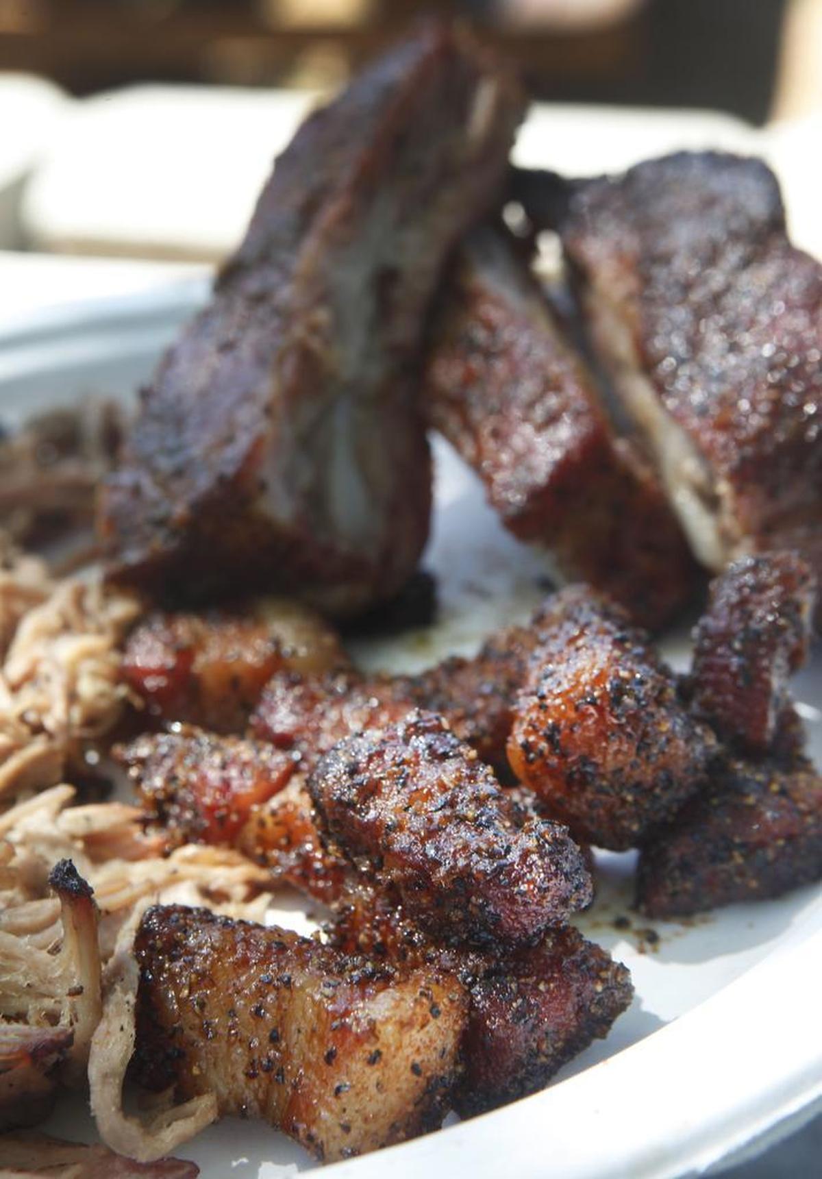 The bacon burnt ends with pork ribs and pulled pork at Heim Barbecue.