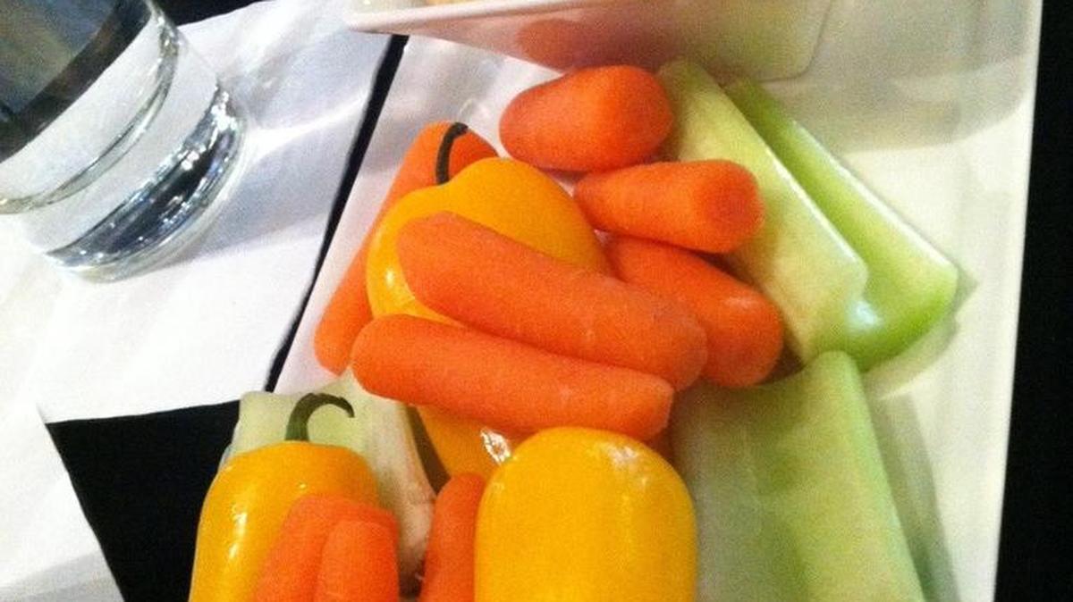 Hummus and veggies are nutrient rich and a perfect snack for when friends gather.