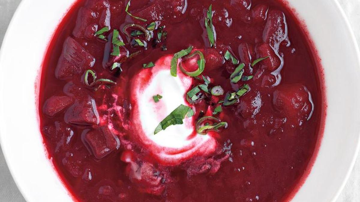 There are dozens of variations on borscht, the Eastern European beet soup. Some (like this one) are served hot, others chilled; some are puréed until smooth, others are chunky — but all showcase the beauty of beets. Sour cream is the traditional topping; its tang tempers the sweetness of the beets.