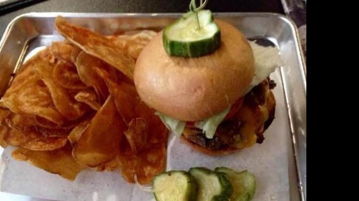 
The Live Oak’s new cheddar-bacon jam “Bockslider” burger.
