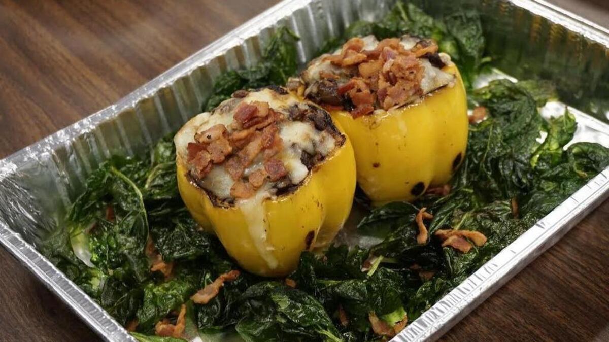 Chorizo red wine marinated Spam picadillo and rice stuffed pepper with flash-fried spinach, by Pedro Ramirez of Grand Prairie, won the Spam Jam recipe contest.