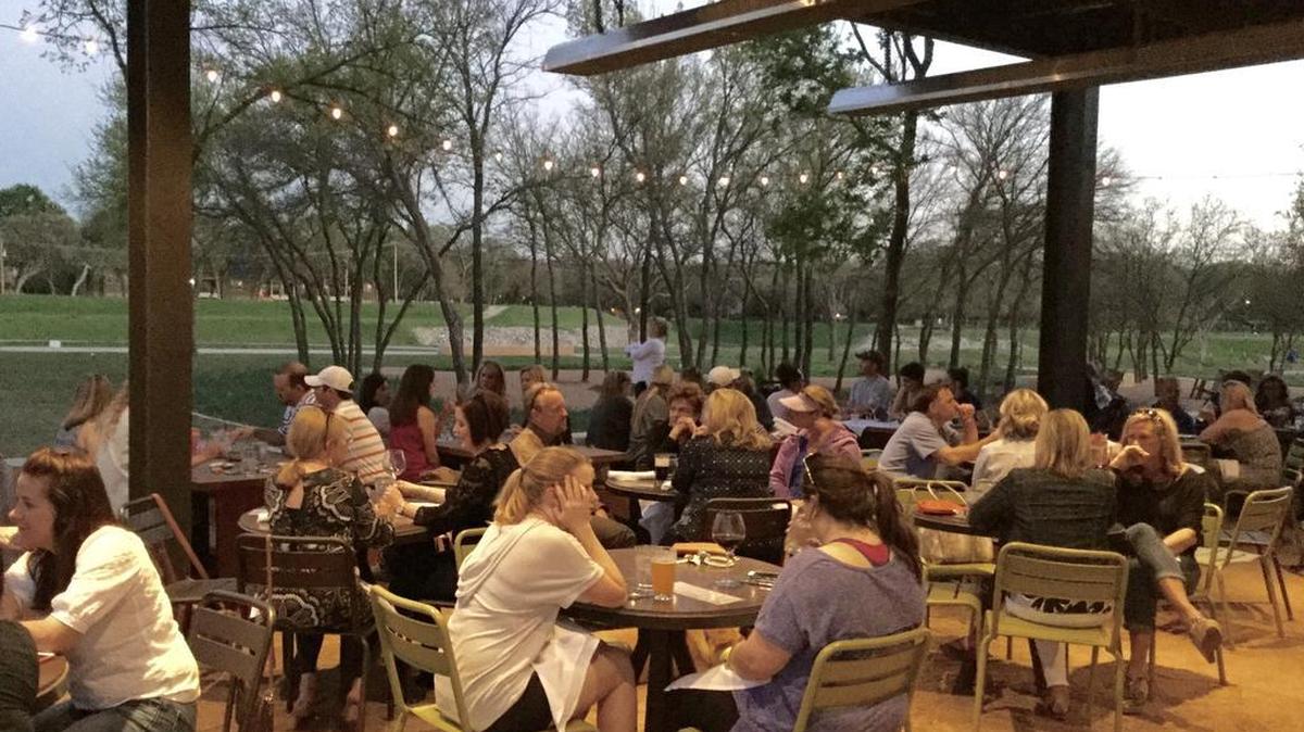 Patio diners at Press Cafe in Fort Worth have a view of the Trinity River and trail.