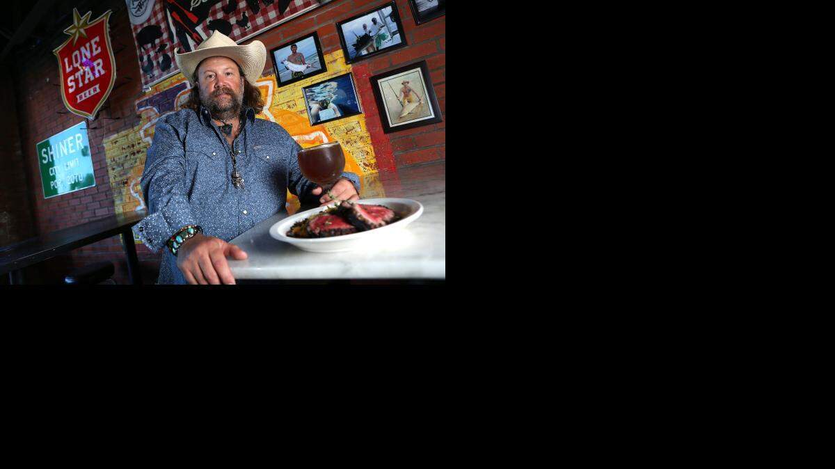 
Fred’s TCU owner Terry Chandler prepared fire-roasted beef tenderloin with chipotle red wine reduction.
