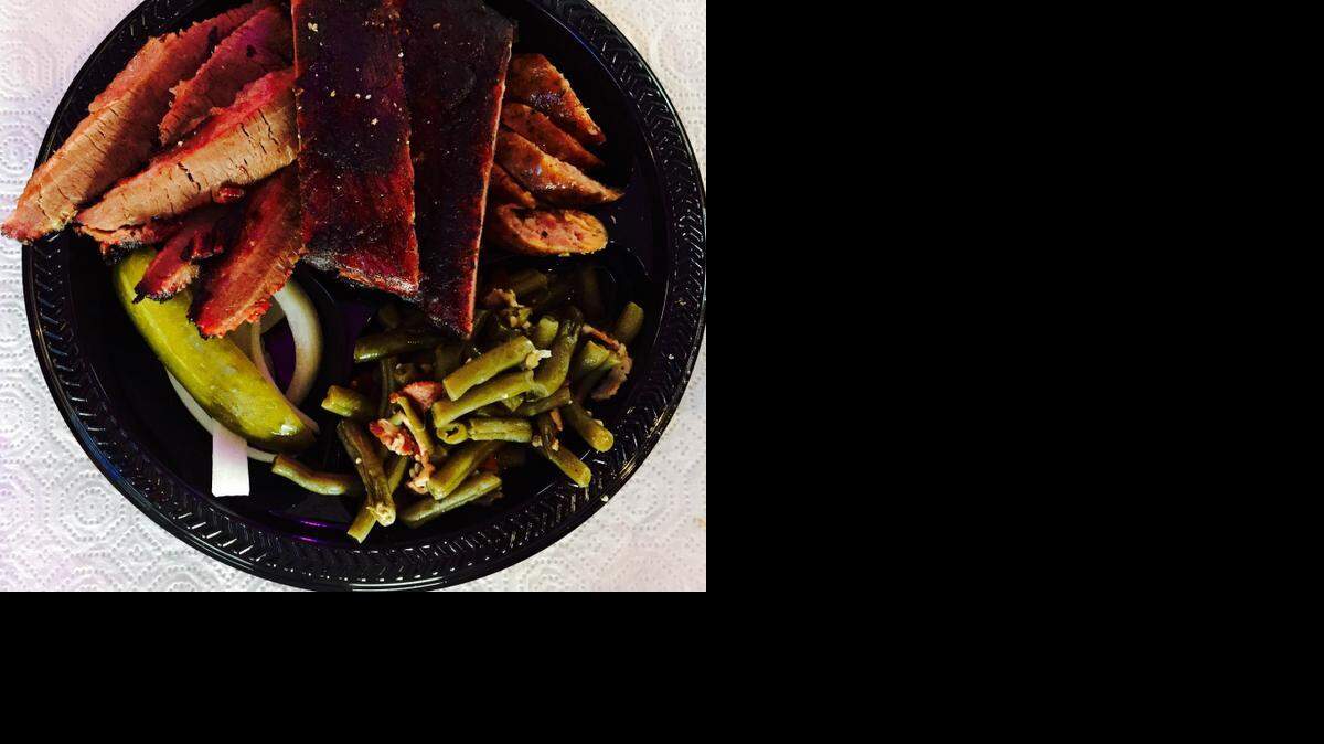 
The BBQ Ranch’s sausage, at right on the combo plate, is a beef-pork combo with longhorn colby cheese.
